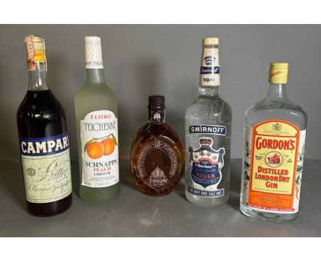 A selection of spirits to include: Peach schnapps, Dimple whisky, Campari, Smirnoff blue vodka and a bottle of Gordons Gin.