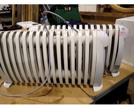 Two DeLonghi Bambino oil filled radiators. All electrical items in this lot have been PAT tested for safety and have passed. 