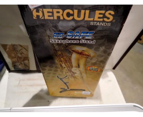 Boxed Hercules saxophone stand. Not available for in-house P&amp;P 