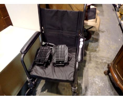 Drive medical wheelchair with footrests, brake and padded seat cushion. Not available for in-house P&amp;P