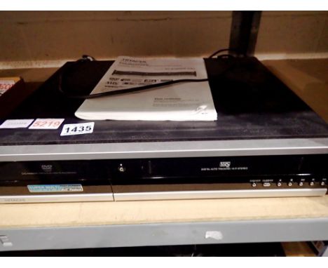 Hitachi DVD and VCR recorder, model DV-RV8500E, remote in office: 5219. All electrical items in this lot have been PAT tested