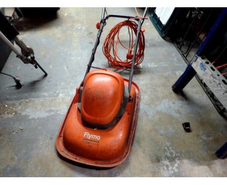 Flymo Turbo Lite 330 electric lawnmower. All electrical items in this lot have been PAT tested for safety and have passed. Th