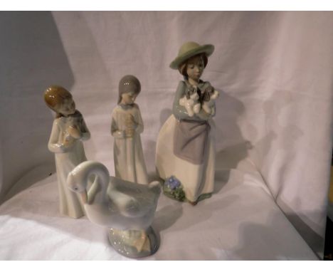 Four Nao figurines. Not available for in-house P&amp;P 