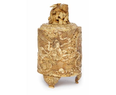 EARLY 20TH CENTURY CHINESE IVORY LIDDED BOX the oval lid with finial carved as a cat, the body richly carved with figures pla