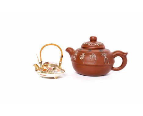 20TH CENTURY CHINESE YIXING TEA POT AND A JAPANESE SATSUMA MINIATURE TEA POT the Yixing tea pot with floral and character dec