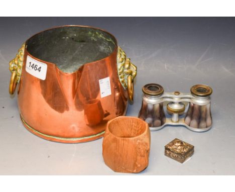 A Robert Thompson Mouseman napkin ring; a copper vessel with brass lion mask handles; a pair of mother of pearl opera glasses