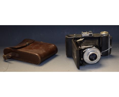 Cameras - a West German Balda Baldafix folding concertina 35mm camera, a Zeiss leather case, an instruction booklet for Kodak