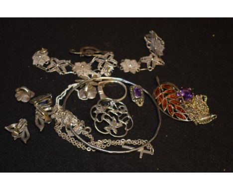 A sterling silver metamorphic leaf brooch / pendant set with polished amber cabochon stones; a novelty sterling silver treble