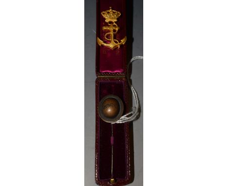 A M.O.T.H. tin hat stick pin; a navy crown and anchor badge (2)