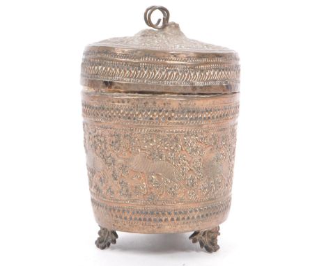 A 19th century Indian silver plate tea caddy container lidded pot. With rams head to top, with raised horns, with floral reli
