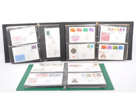 A collection of UK first day covers franked postage stamps. To include, Christmas 1986, Sir Isaac Newton, Flowers, St John Am