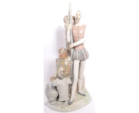 A vintage 20th century Spanish Lladro style Don Quixote china porcelain figure statue. The tall figure in pastel colours stan