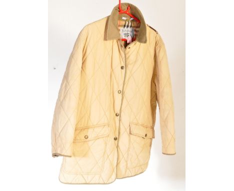 Burberry - A vintage designer 20th century gentlemen's classic style jacket / coat. The coat having green corduroy collar wit