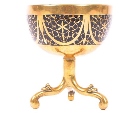 A 19th century Victorian brass enamelled coconut cup. The cup having basin of coconut shell with body enamelled in black Pers