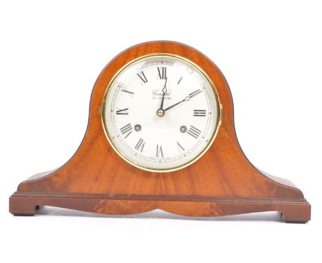 Comitti - A vintage 20th century Comitti of London 8 day mantel clock. Napoleon shape with a white face and ebonised chapter 
