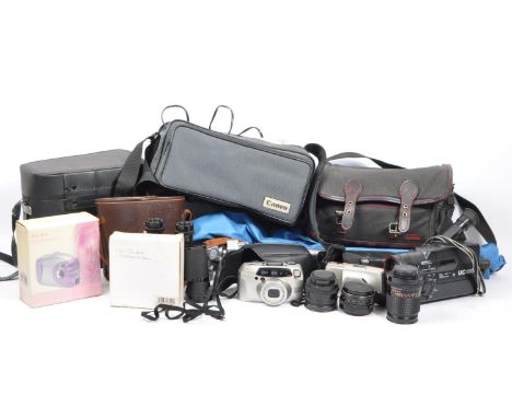 A collection of vintage 20th century and later cameras, video camera, lenses and photographic accessories. To include, a Cano