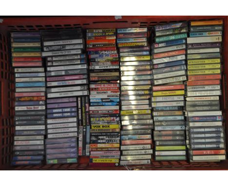 A collection of late 20th century musical cassette tapes, spanning various decades and multiple genres to include artists; Pr