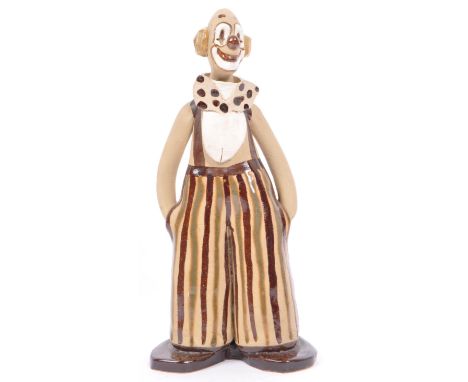 Elizabeth Haslam - A vintage 1970s studio pottery clown modelled by Elizabeth Haslam. Incised maker's label to base, Measures