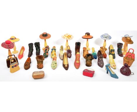 A collection of approximately 44 unboxed ' just the right shoe 'figurines by 'Raine' and the 'Vintage Collection' by Leonardo