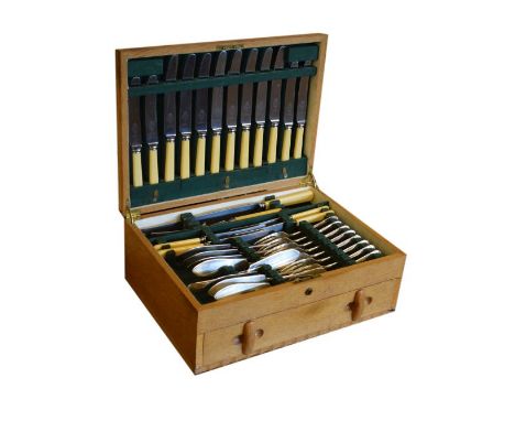 Mid 20th Century light oak cased canteen of silver plated cutlery, Turton Super A1 EPNS, in two fitted trays to include; dinn