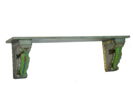 Indian (Jaipur) painted wooden shelf of rectangular form on leaf carved corbel supports, 114cm wide   Condition: 
