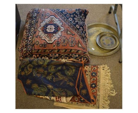 Selection of Eastern textiles and metalware to include; two Persian rug panels as cushions, two Indian printed rugs, Indian e