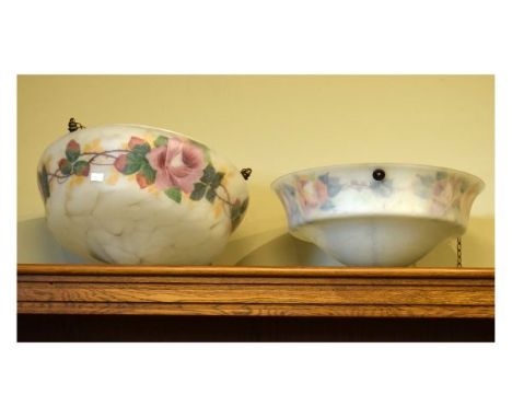Two 1920's/1930's period opaque glass ceiling light shades, each with floral decoration   Condition: 