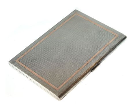 George VI engine turned silver cigarette case decorated with a silver gilt band, 6.7oz approx   Condition: 
