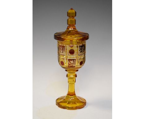 Good quality 19th Century Bohemian cut amber glass goblet and cover having typical engraved ruby flash reserves   Condition: 