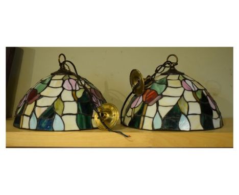 Two modern Tiffany style glass ceiling light shades, each of hemispherical form   Condition: 