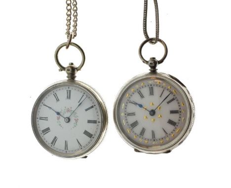 Two engraved white metal cased key wind fob watches, each having a decorative white enamel dial with Roman numerals, the firs