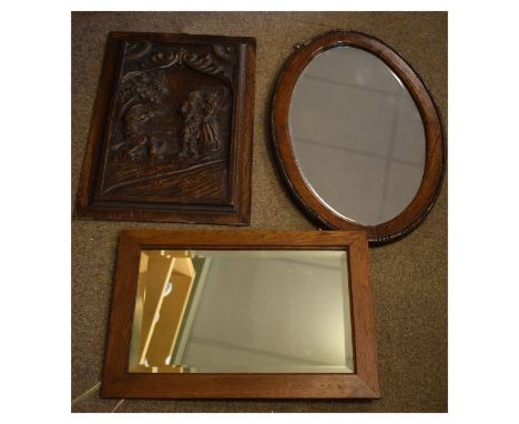 19th Century carved oak relief panel depicting a courting couple being serenaded by a musician playing a fiddle, together wit