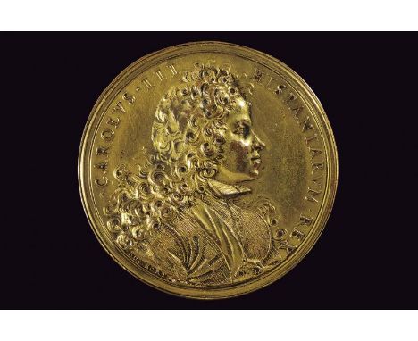 dating: 18th Century provenance: Italy, Made of gilded bronze. On the obverse a bust (left); on the borders 'CAROLVS HISPANIA