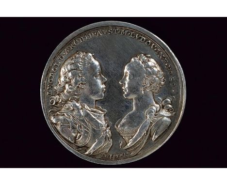 dating: 1765 provenance: Austria, Made of silver. On the obverse, the busts of Peter Leopold with cuirass and Maria Ludovica 