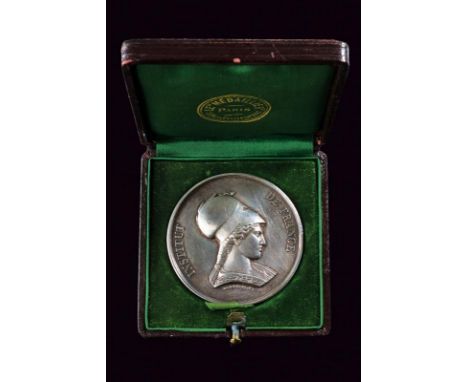 dating: 1878 provenance: France, Silver medal. On the obverse bust of Minerva with helmet (right). Inscription 'INSTITUT DE F