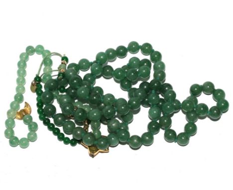 A green bead necklace and two green bead bracelets (possibly) jade 