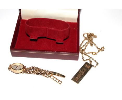 A gold lady's Rotary wristwatch and 9ct gold ingot 