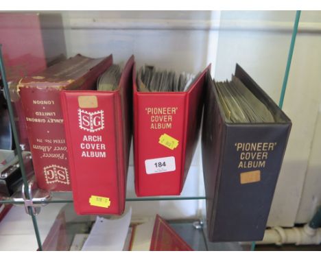 Two albums of first day covers, from late 1960s to mid 1970s, and a partial album of first day covers and commemorative coins