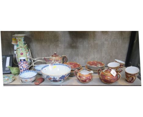 A Japanese tea service, with dragons and red ground, a pair of rice bowls, a large bowl (with hairline crack), two vases and 