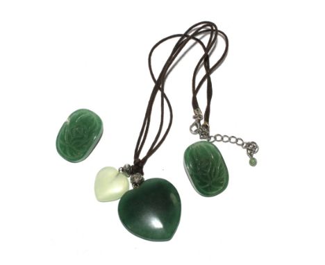 A pair of jade earrings and matching pendant 