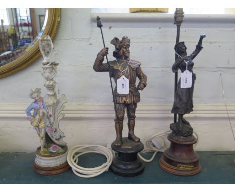 A late 19th century French spelter figure of a triangle player, 43 cm high, another of a figure holding a staff,  47 cm high 