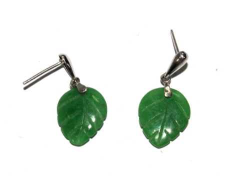 A pair of green jade earrings in the form of leaves 