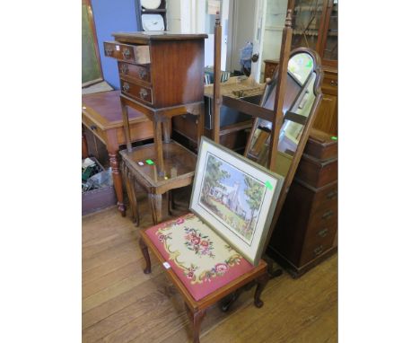 A reproduction mahogany occasional table with three drawers, 45 cm wide, a nest of three tables, a stool, a cheval mirror, a 
