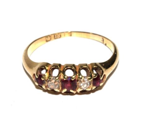 A diamond and ruby five stone ring set in 18 carat gold 