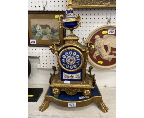 An ormulu and enamel mantle clock