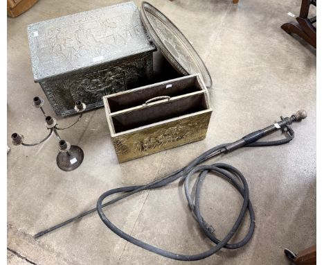 A brass log box, paper rack, table top, sprayer and candelabra