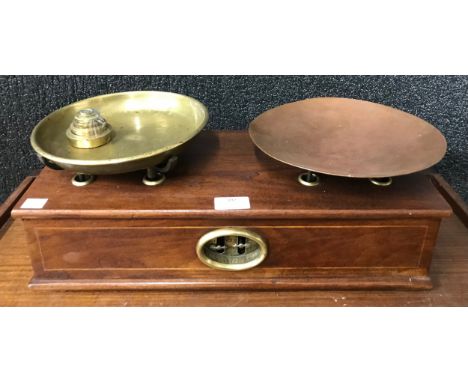 A set of Victorian mahogany and brass scales and set of brass graduated weights 