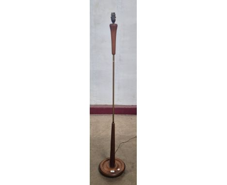 A teak standard lamp 