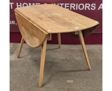 An Ercol Blonde elm and beech Windsor drop leaf table table 