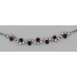 1 Collier WG 14ct. mit Rubinen je ca. 0,2ct. und Brillanten je ca. 0,06ct., min. Tsp. [KEINE -10% IM